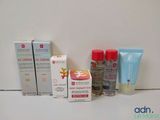 many different types of skin care products displayed on a shelf