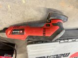 an image of a corded electric tool with a battery