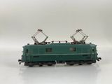an image of a green train car on a white surface