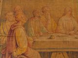 painting of a group of people sitting around a table
