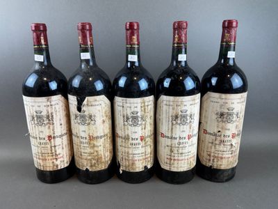 six bottles of wine are lined up in a row