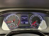 a close up of a car dashboard with a speedometer and gauges