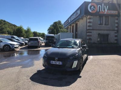 a car parked in front of a building with a lot of parked cars