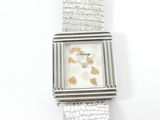 an image of a close up of a watch on a white surface