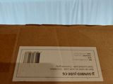 a brown box with a barcode on it sitting on a table