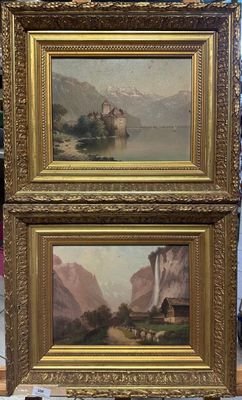 deux tableaux encadrés représentant des montagnes et un lac, avec un château en arrière-plan