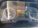 a close up of a car dashboard with a speedometer