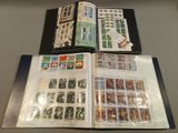 a lot of stamps in a folder on the table