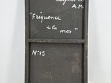 a picture of a sign with writing on it