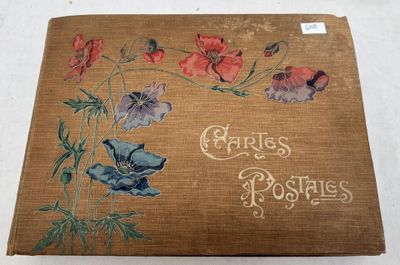 an old book with a picture of a bunch of flowers on it
