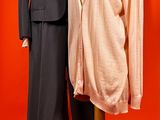 a mannequin and a suit on display on a mannequin stand