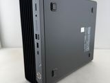 a close up of a small computer on a white surface