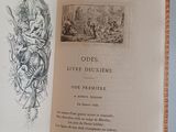 an open book with a drawing on it on a table