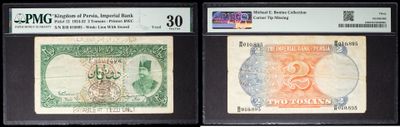three different types of currency are on display in a display case