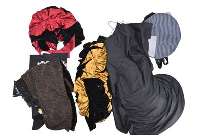 a pile of clothing that is laying out on the ground