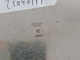 a close up of a piece of metal with a sticker on it