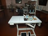 a sewing machine sitting on a table in a room