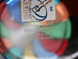 a close up of a glass with a label on it