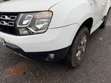 a white pick up truck parked on the side of the road