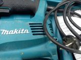 a blue tool that is sitting in a blue box