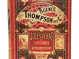 un vieux livre à la couverture rouge et aux lettres dorées