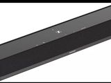 a close up of a black speaker on a white background