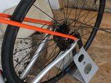 a close up of a bicycle wheel on a stand