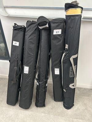 a lot of bags that are lined up on the floor