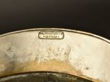 a close up of a metal pan with a lid