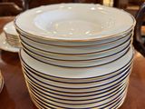a stack of plates sitting on a table in a store