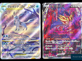 two pokemon cards with different designs on them on a black background