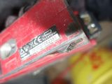 a close up of a piece of metal with a red box on top of it