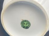 an image of a close up of a cup on a table