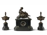 three statues of a woman sitting on top of a clock