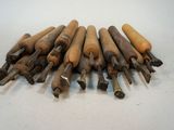 a lot of woodworking tools that are sitting on a table