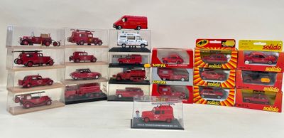 a lot of red toy cars in a display case
