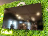 a large flat screen tv mounted on the wall