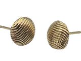 a pair of gold tone earrings with wavy design