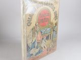 un vieux livre pour enfants avec l'illustration d'un homme et d'une femme assis sur un banc