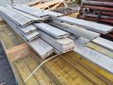 several pieces of wood are stacked on top of each other on a table