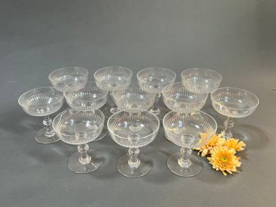 a lot of empty wine glasses sitting on a table