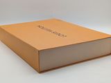 an open box with a logo on it sitting on a white surface
