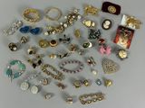 many different types of jewelry on the table