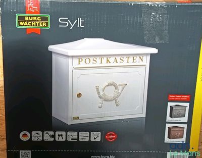 une boîte sur laquelle est représentée une boîte aux lettres