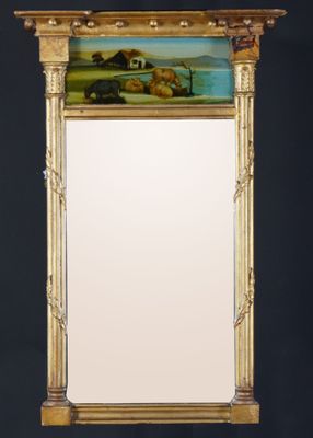 l'image d'un miroir avec une peinture au dos de celui-ci