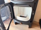 a television that is sitting on top of a stove