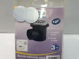 a packaging of a toilet brush holder on a white table