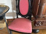 a chair that is sitting in a room with a table