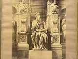 framed photograph of a statue of a man sitting on a throne