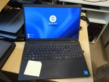 a laptop that is sitting on a desk in a room